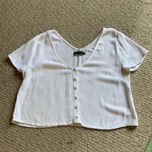 Kendall and Kylie button up top